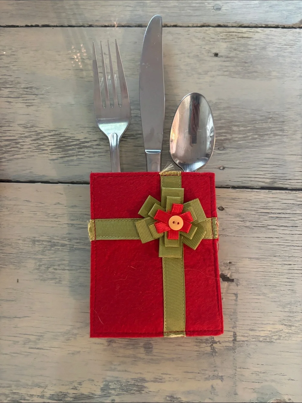 8 Red Felt Utensil Holder with Green Ribbon Accent